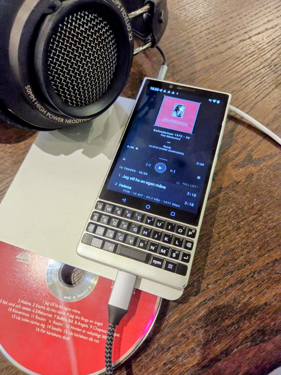 Redbook player on BlackBerry Key2 with CD and Philips Fidelio headphones